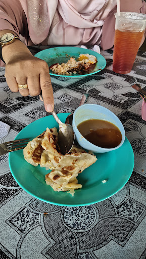 Man Roti Canai Bukit Kayu Hitam